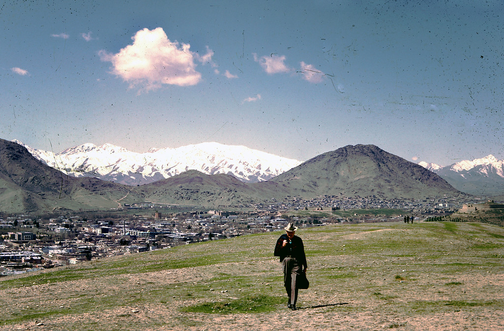 "Dr. Bill Podlich on a hillside in Kabul. "