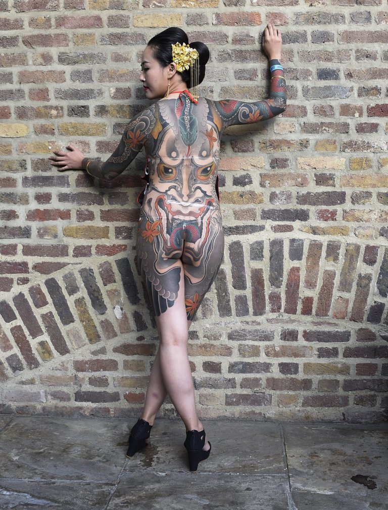 epa05553616 A tattoo enthusiast poses for photos at the London Tattoo Convention in London, Britain, 23 September 2016. The International London Tattoo Convention runs from 23 to 25 September brings together tattoo artists from the US, Australia, Canada, Japan and UK. EPA/FACUNDO ARRIZABALAGA