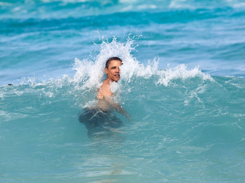 Hawaii, Jan. 1, 2012. Swimming at Pyramid Rock Beach in Kaneohe Bay. (Official White House Photo by Pete Souza)