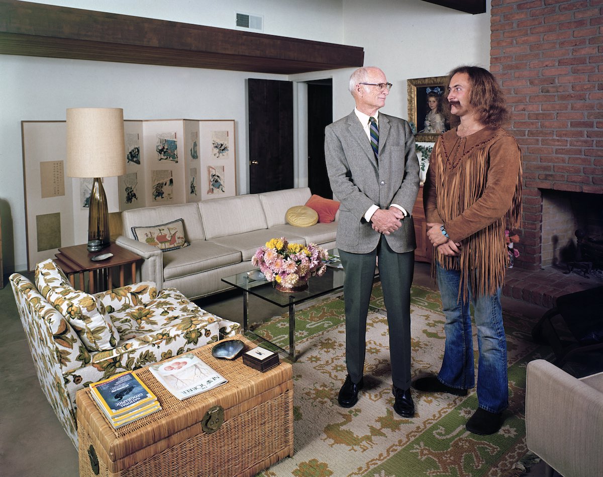 Singer David Crosby (R) standing w. father Floyd in father's house.